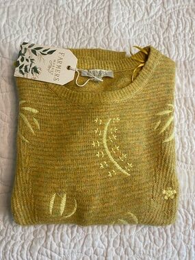 Mustard Crewneck Sweater with Floral Embroidery side cuts and ties